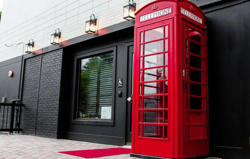 Exterior of Red Phone Booth speakeasy in downtown Durham