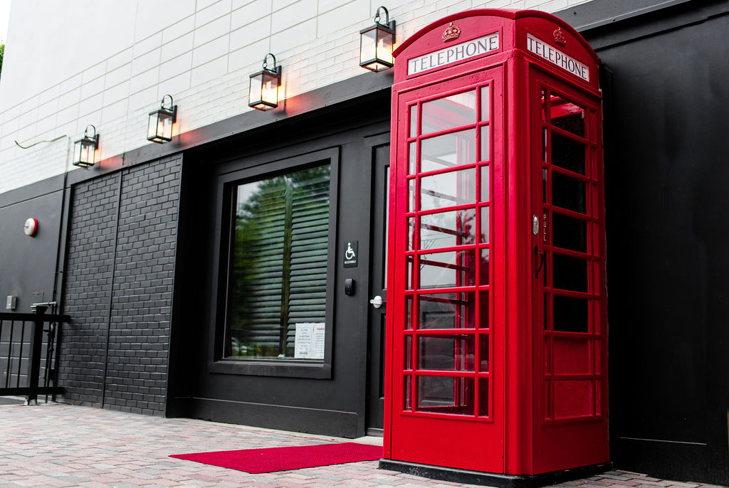 Exterior of Red Phone Booth speakeasy in downtown Durham
