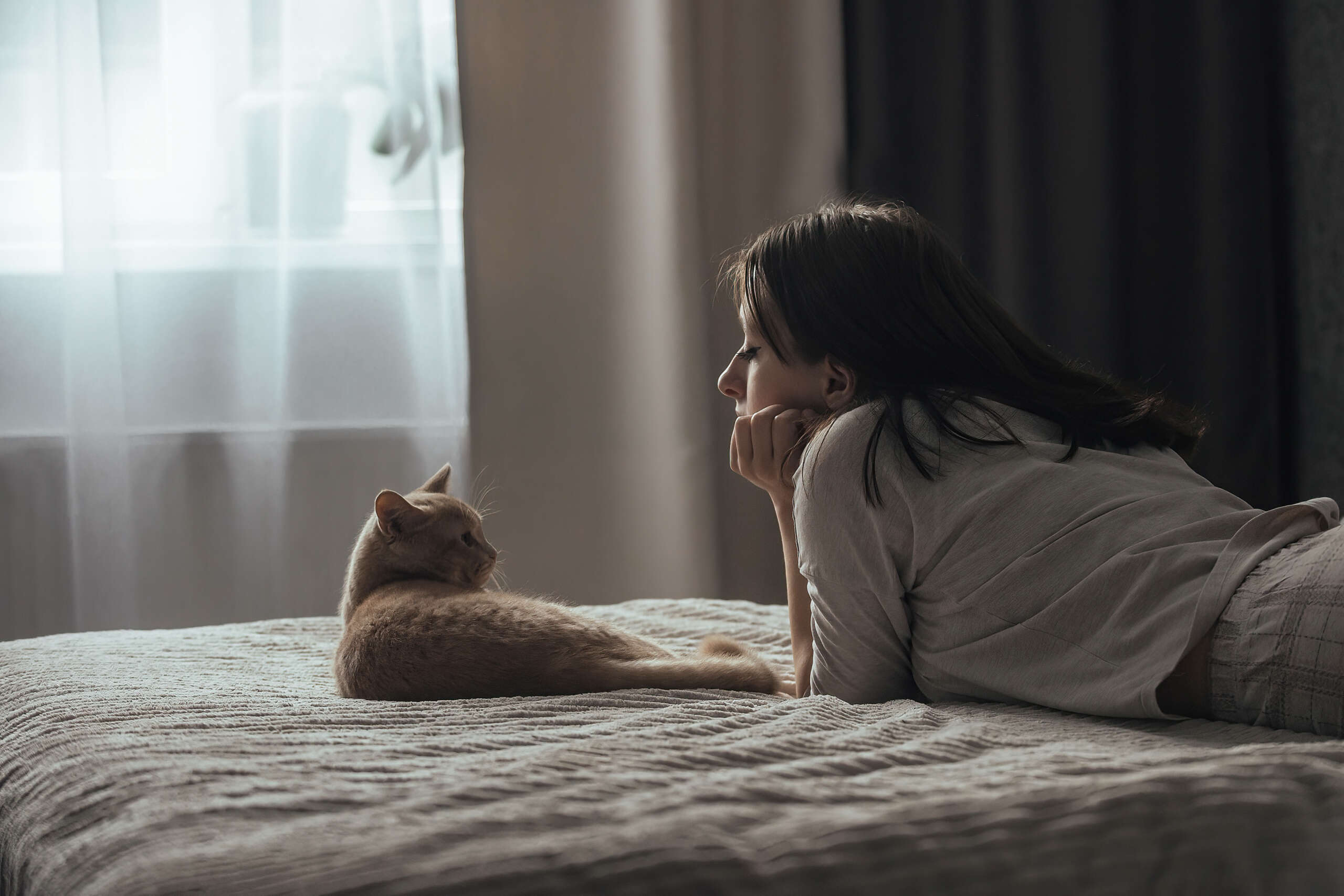Depression Cat Woman on Bed