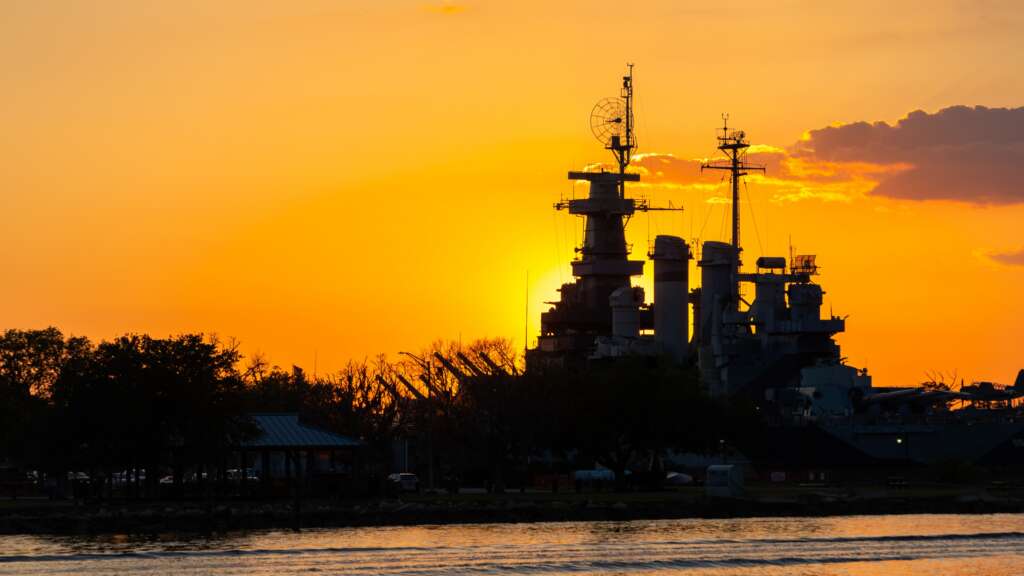 Battleship North Carolina a sunset